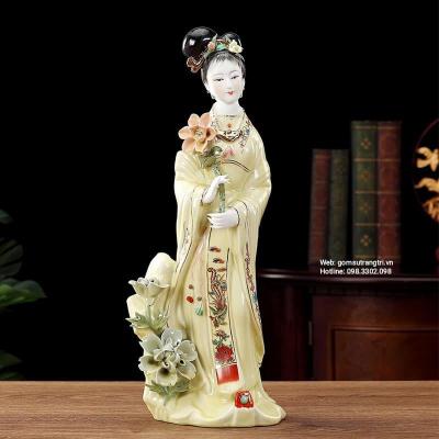 TƯỢNG SỨ CÔ GÁI CẦM NHÁNH HOA